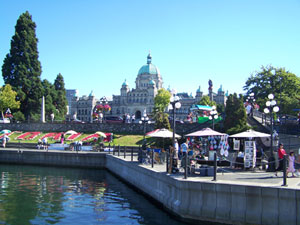 Victoria's exciting and busy Inner Harbour showing the BC Legislative Building